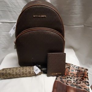 Michael kors backpack, wallet, umbrella, and scarf